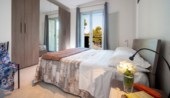 media.Slide-Appartamento-1a_1ResidenceGiardini 1